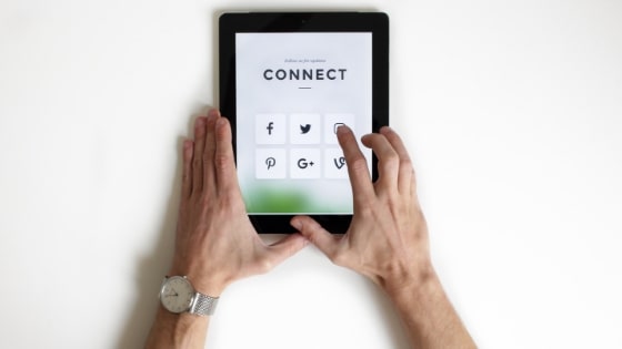 person using tablet.