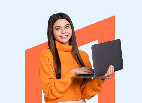 girl in orange turtleneck holding a laptop.