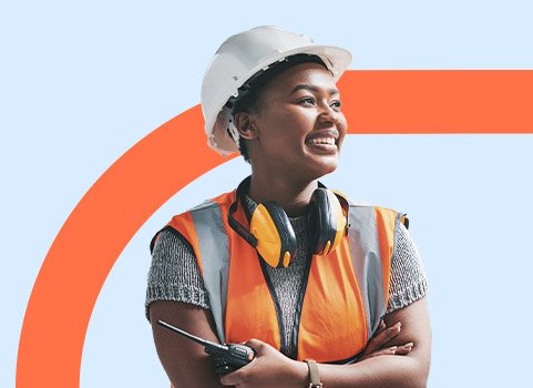 Woman in safety vest and hard hat.