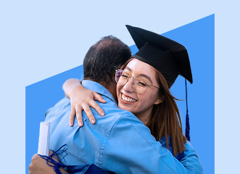 Girl in grad cap hugging older man.