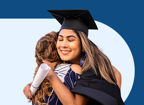 Woman in graduation cap and gown hugging daughter.