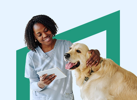 Woman in light blue scrubs with dog.