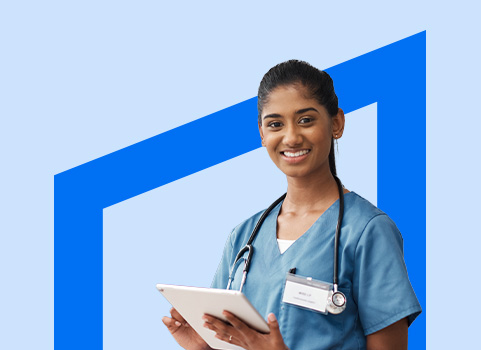 Women in blue scrubs wearing stethoscope and using a tablet.