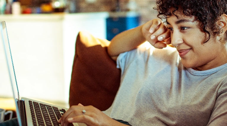 student studying on laptop.