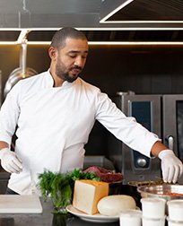 gourmet chef cooking in kitchen.